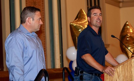 Lemoore Volunteer Firefighter Brahm Rossiter introduces fellow firefighter, Aaron Anacleto, during Friday's Kings County Public Safety Appreciation Luncheon.